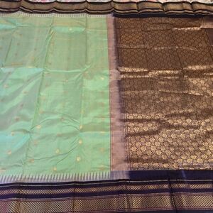 Beautiful Sea Green And Navy Pure Gadwal Silk Saree With Contrast Blouse Piece